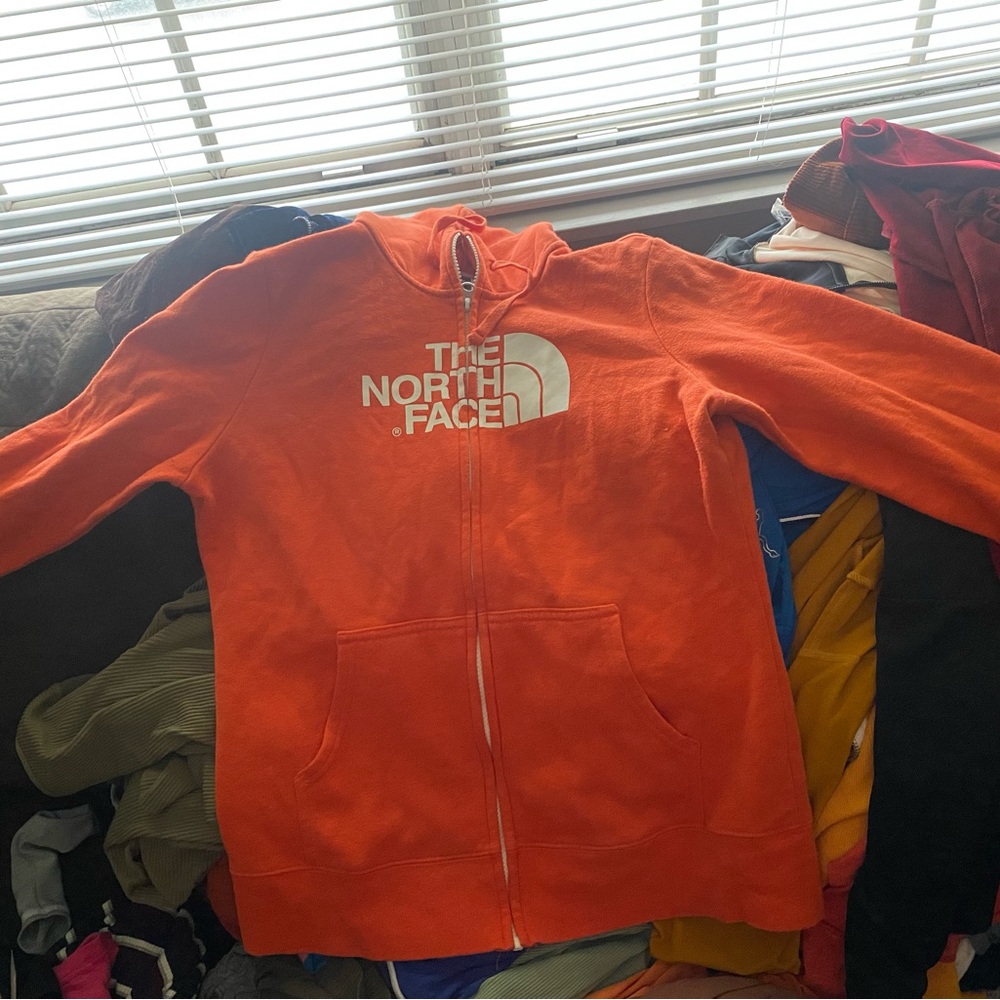 Orange North Face Zip up hoodie jacket